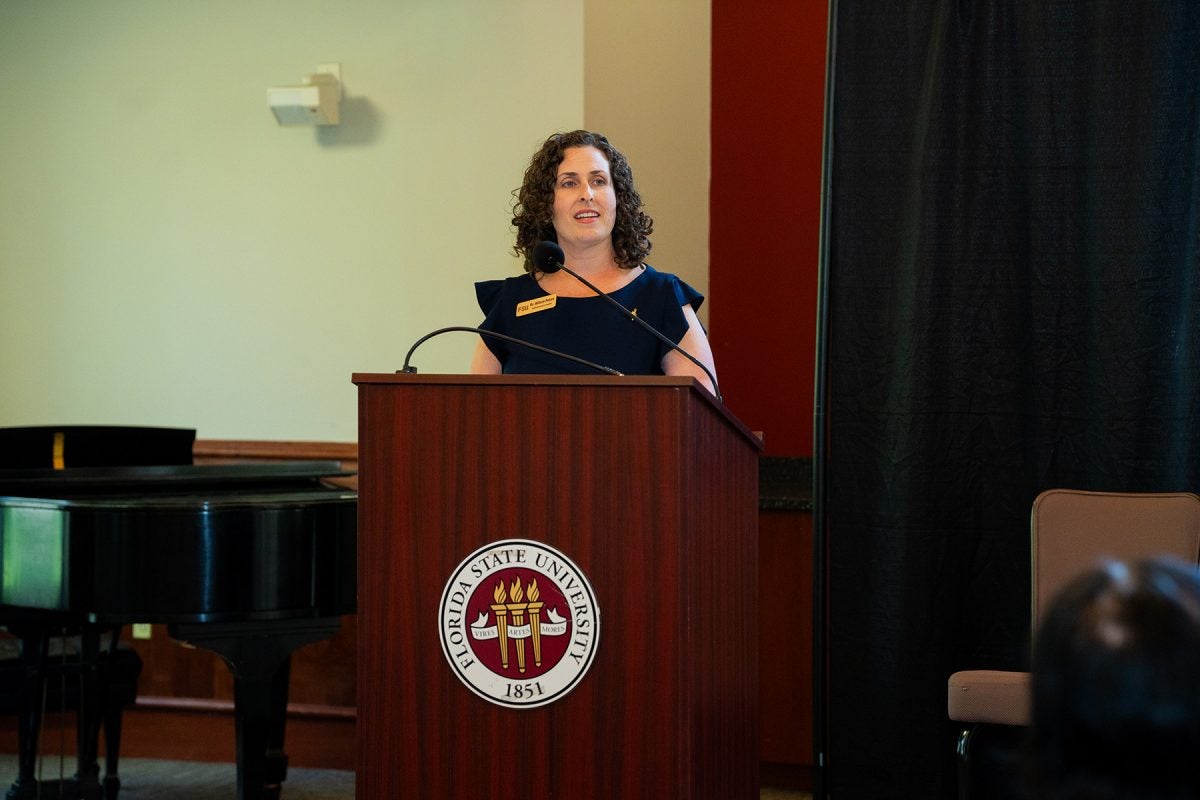 Allison Peters at Podium